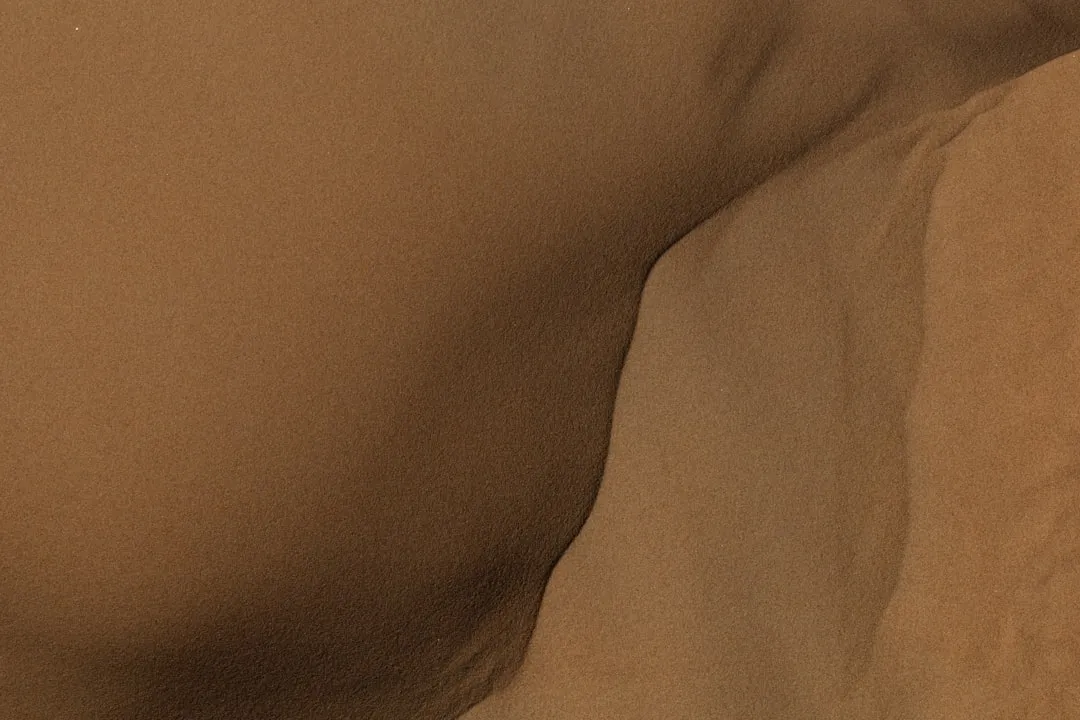 Close-up of sand dunes with soft curves
