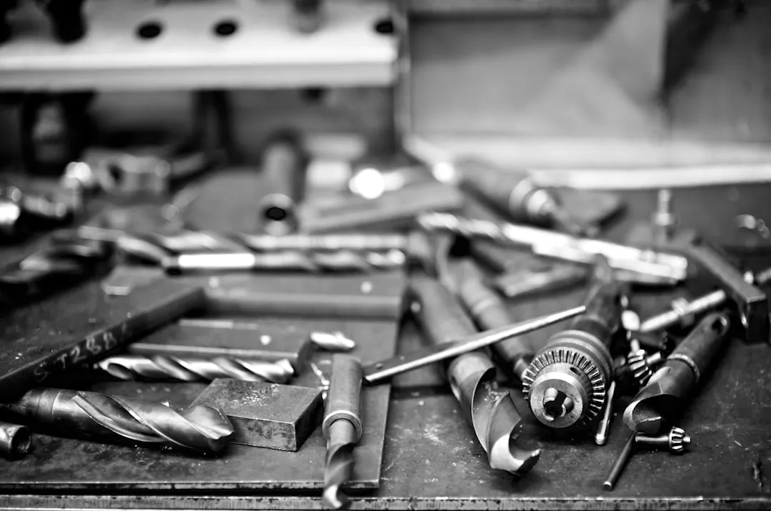 Workshop tools are scattered on a work table.