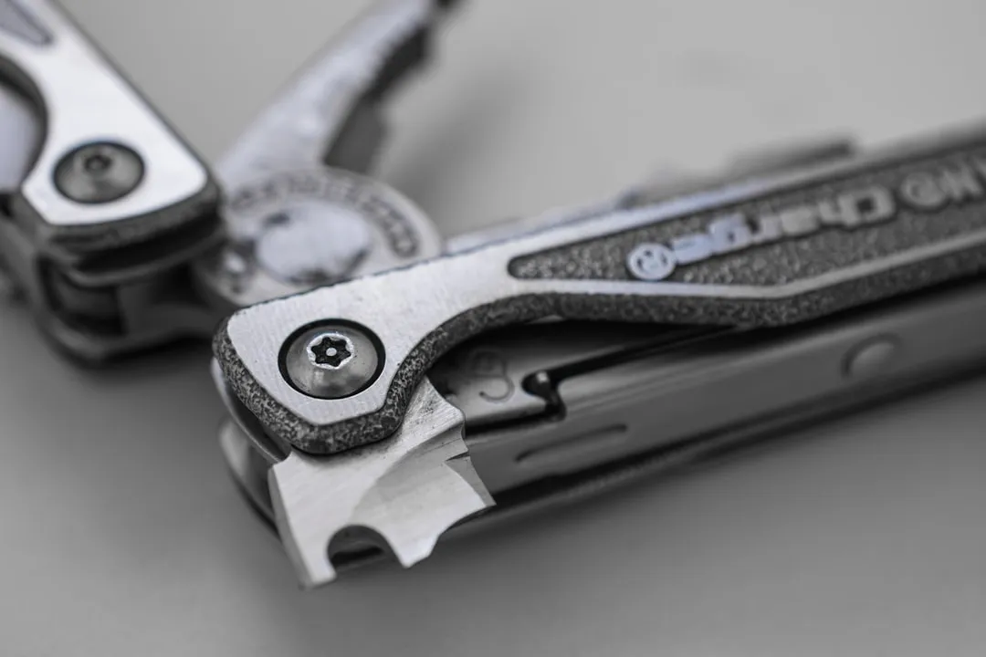 a close up of a pair of scissors on a table